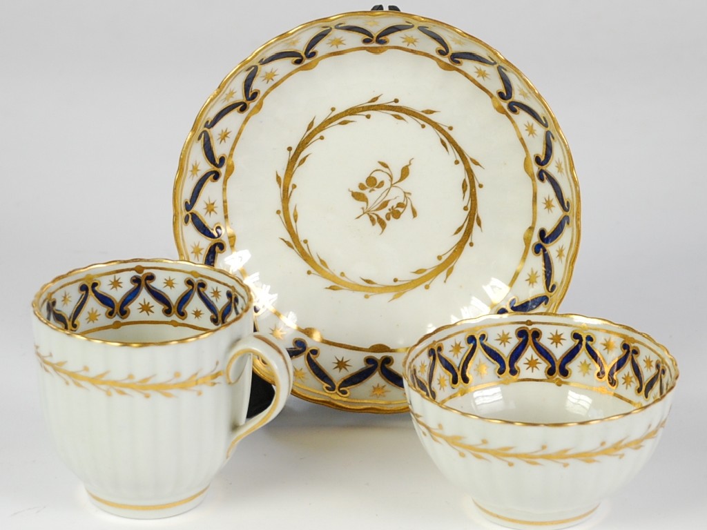 Appraisal: EIGHTEENTH CENTURY FIRST PERIOD WORCESTER FLUTED PORCELAIN TRIO comprising SAUCER