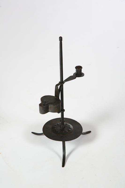 Appraisal: TABLETOP LIGHTING DEVICE American th century wrought iron Betty lamp