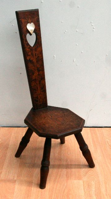 Appraisal: A mahogany hall chair pokerwork decorated with a mother-of-pearl heart