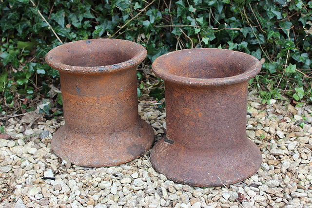 Appraisal: A PAIR OF OLD IRON CAPSTANS each cm high