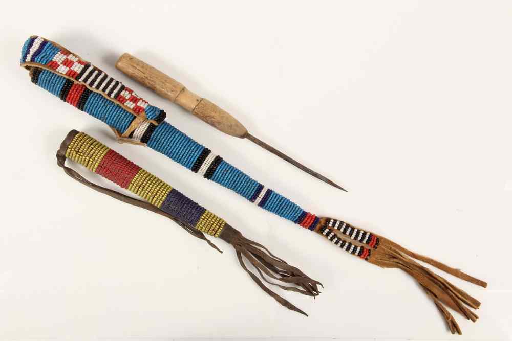 Appraisal: NATIVE AMERICAN TOOL SHEATHS - Two Northern Plains Indians Beaded