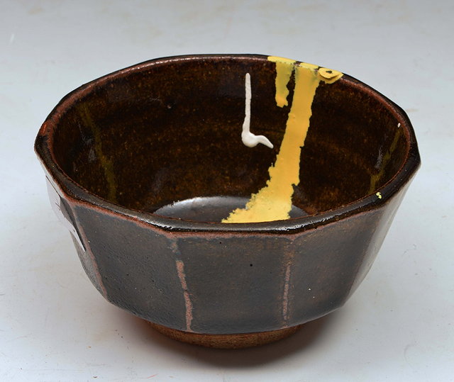 Appraisal: Henry Hammond British - Bowl faceted and with tenmoku glaze