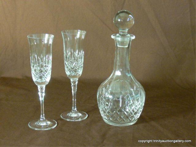 Appraisal: Lead Crystal Diamond Pattern Decanter Champagnes Includes a round polished