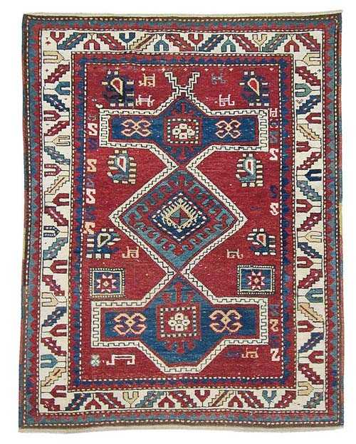 Appraisal: FACHRALO antique Red ground with green and red medallion white