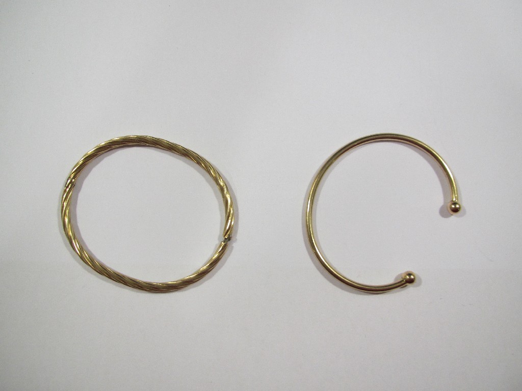 Appraisal: Two ct gold bangles Approximately gms