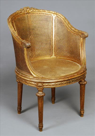 Appraisal: A carved giltwood tub chair in Louis XVI style circa