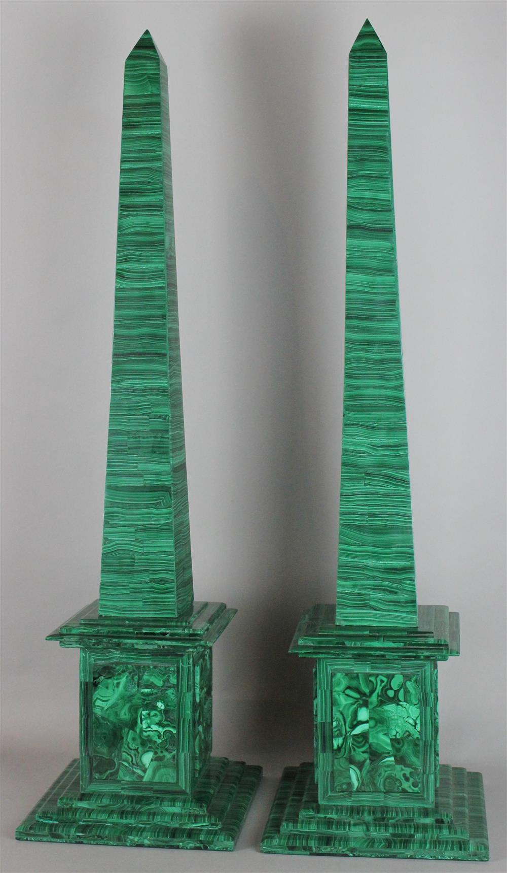 Appraisal: PAIR OF LARGE MALACHITE OBELISKS ON STEPPED PLINTHS veneered tapering