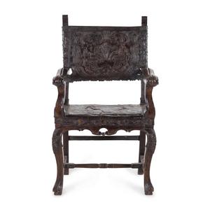 Appraisal: A Henry II Style Leather-Upholstered Open Armchair th th Century