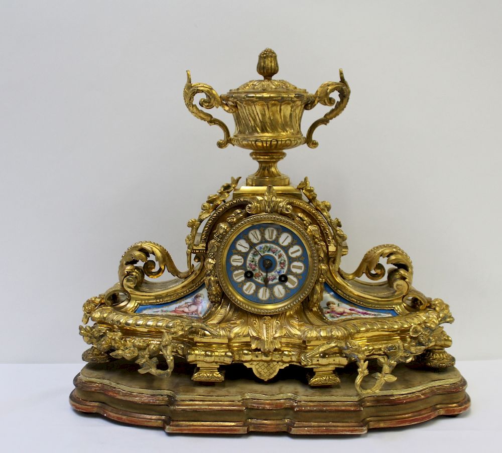 Appraisal: Antique Gilt Bronze French Clock with Sevres Porcelain Inserts From