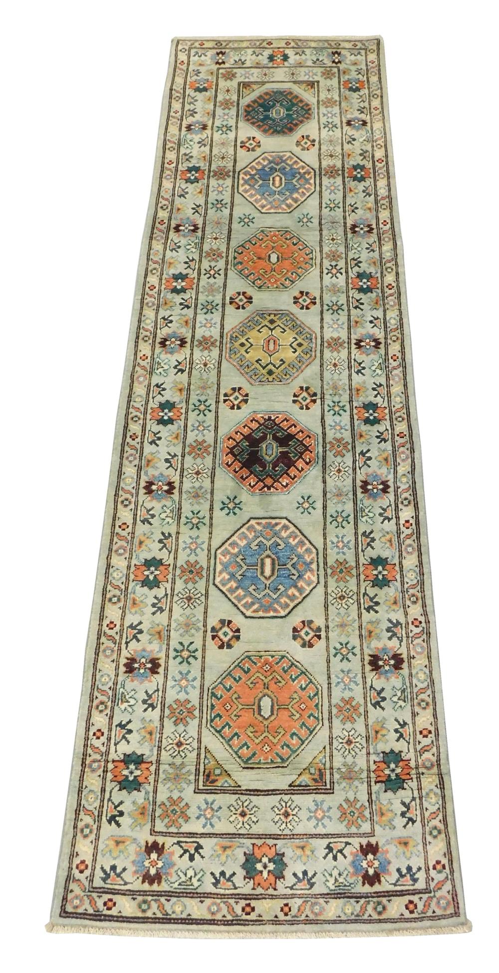 Appraisal: RUG Uzbek Kazak ' x ' handmade wool celadon field