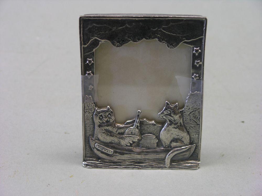 Appraisal: A novelty silver plated photograph frame The Owl and The