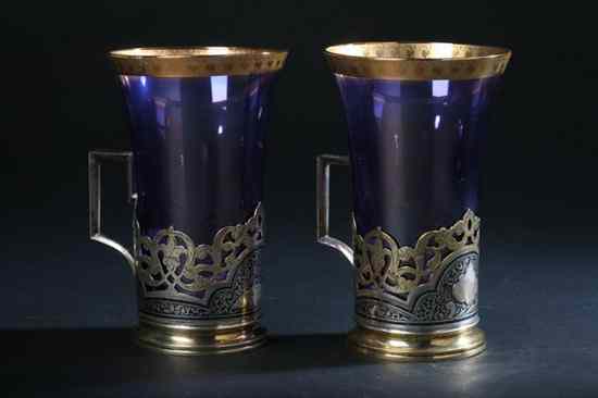 Appraisal: TWO EASTERN EUROPEAN SILVER-GILT AND NIELLO TEA GLASS HOLDERS th