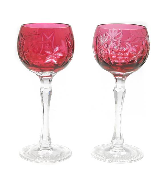 Appraisal: A set of twenty-four cranberry cut to clear glass wine