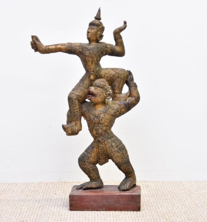 Appraisal: Tibetan wood carved figures probably th c gilt painted with