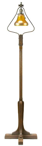 Appraisal: A Gustav Stickley oak and hammered copper floor lamp model