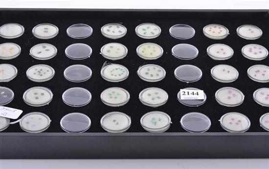 Appraisal: A TRAY OF THIRTY GROUPED PARCELS OF GEMSTONES INCLUDING EMERALD