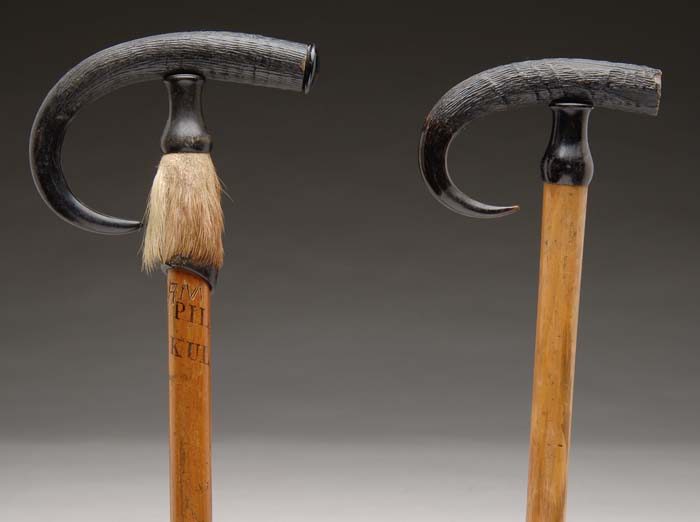 Appraisal: TWO SWISS CLIMBING CANES The handles are goat horned each