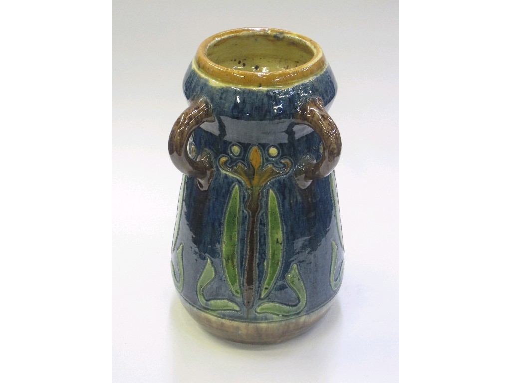 Appraisal: Belgian pottery vase with lug handles and a Royal Vienna