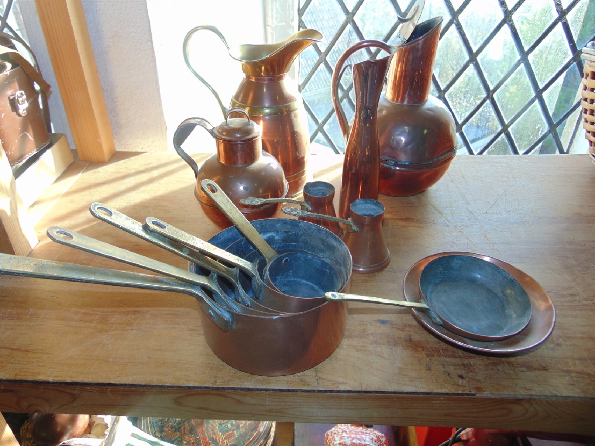 Appraisal: Antique metal wares to include a graduated set of small