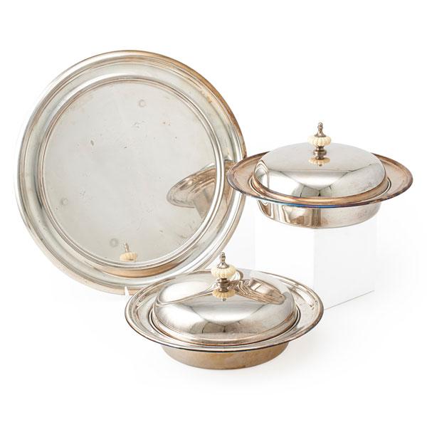 Appraisal: CHRISTIAN DIOR SILVER PLATE SUPPER SET Two oval covered dishes