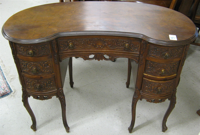 Appraisal: LOUIS XV STYLE CARVED WALNUT KIDNEY DESK American mid th