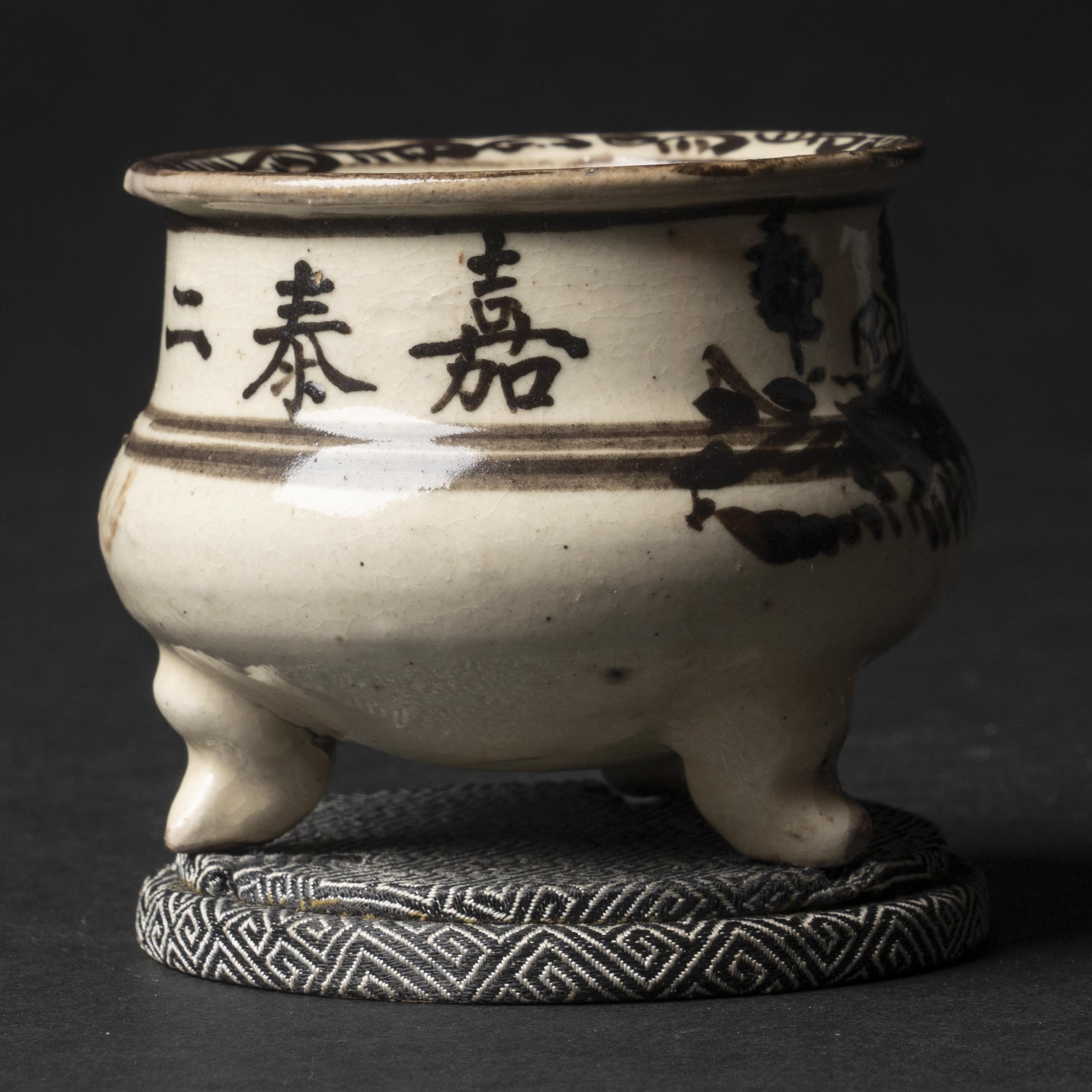 Appraisal: A Cizhou-Type Tripod Censer Southern Song Dynasty or Later height