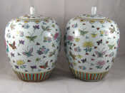 Appraisal: A pair of Chinese ceramic jars and covers the white