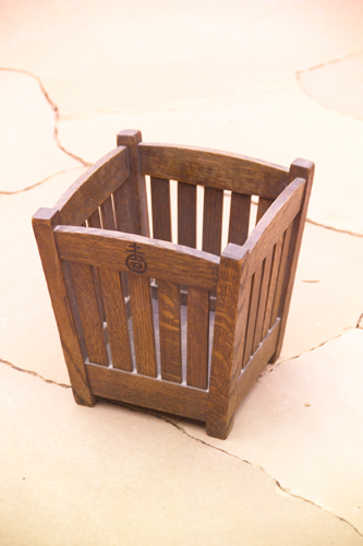 Appraisal: ROYCROFT Slatted wastepaper basket with curved edges Skinned original finish