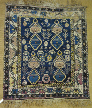 Appraisal: A Kazak rug the geometric design on blue ground first