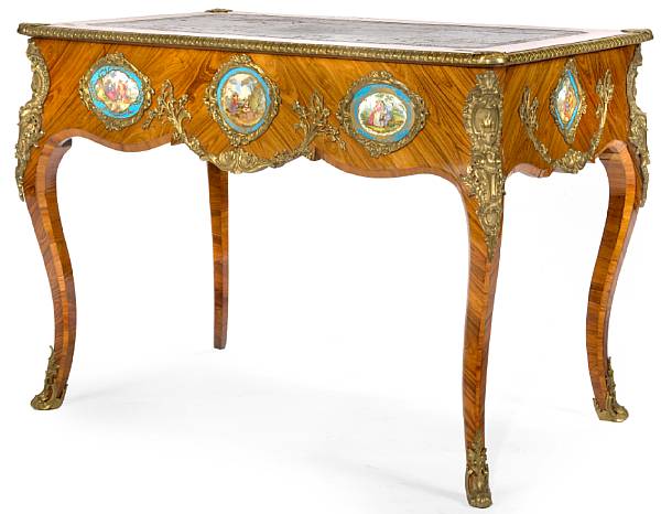 Appraisal: The rectangular top with inset tooled leather and gilt bronze