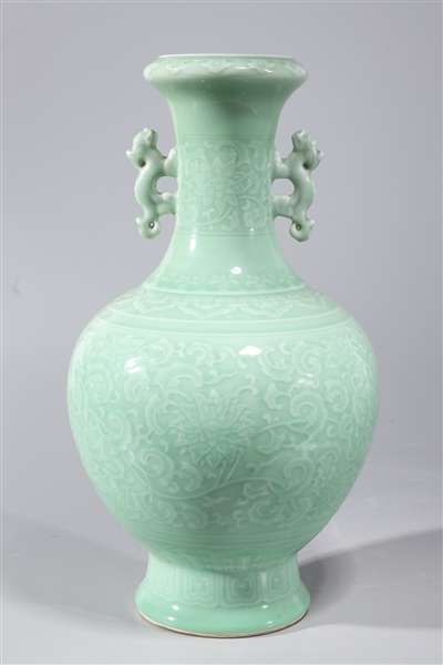 Appraisal: Chinese celadon glazed porcelain vase with molded handles and incised