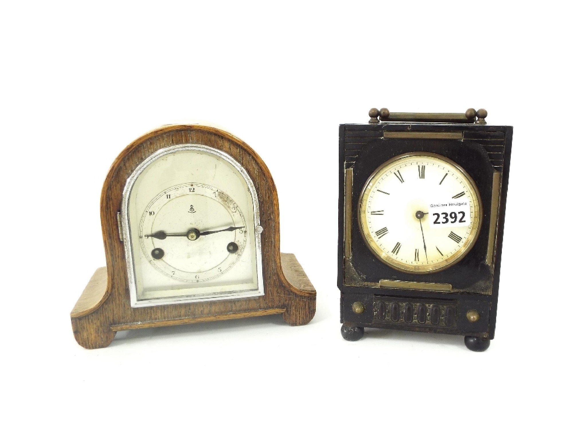 Appraisal: Small oak Napoleon hat two train mantel clock high together