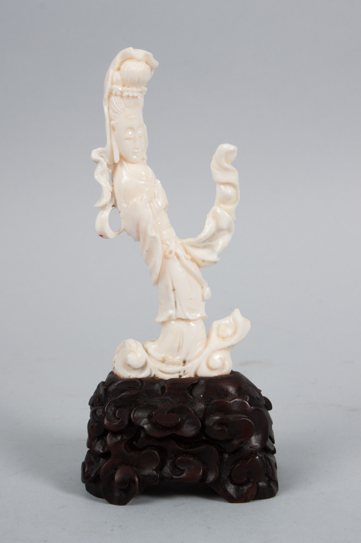 Appraisal: Chinese white coral figure modeled as female deity on carved