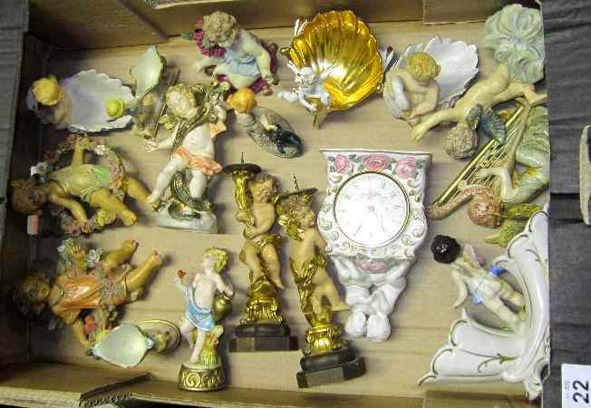 Appraisal: A Collection of various porcelain figures Cupids Clock Wallaplaque etc