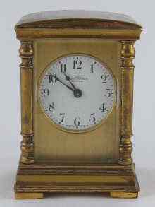 Appraisal: A domed type miniature carriage clock the circular enameled dial