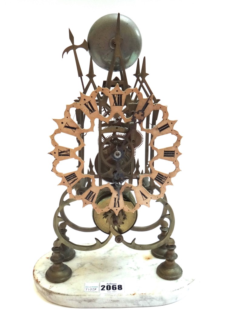 Appraisal: A brass framed skeleton clock th century of typical form