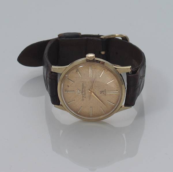 Appraisal: A k gold and leather strap watch Girard-Perregaux Gyromatic model