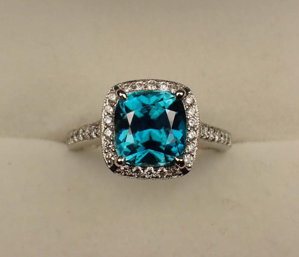 Appraisal: BLUE ZIRCON DIAMOND AND FOURTEEN KARAT GOLD RING WITH APPRAISAL