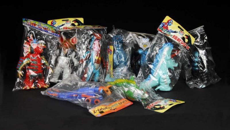 Appraisal: Large Lot of Vinyl Figures Description Japanese Slash Marmit Condition