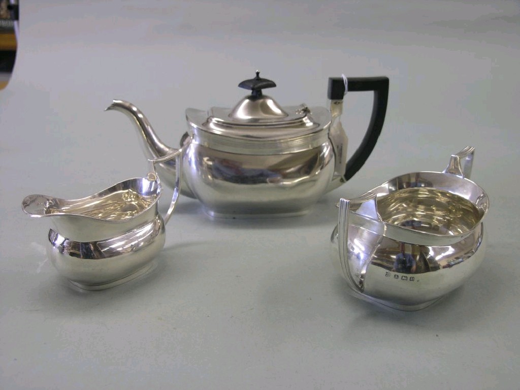 Appraisal: A silver tea set consisting of teapot two handled sugar