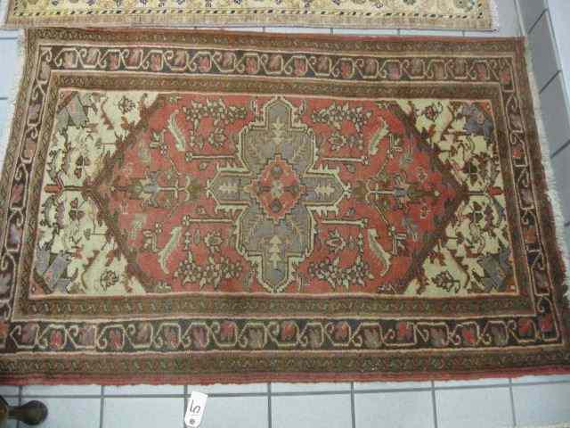 Appraisal: Heriz Persian Handmade Rug geometric stylized floral earthtones ' ''