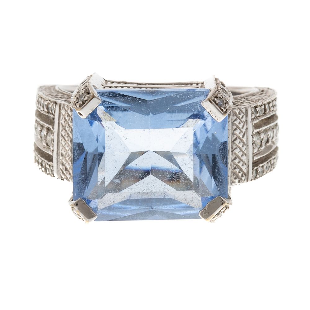 Appraisal: A Judith Ripka Blue Topaz Diamond Ring in K K