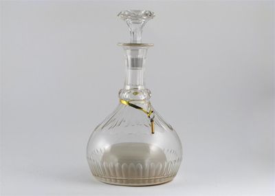 Appraisal: A cut glass musical decanter and stopper the neck with