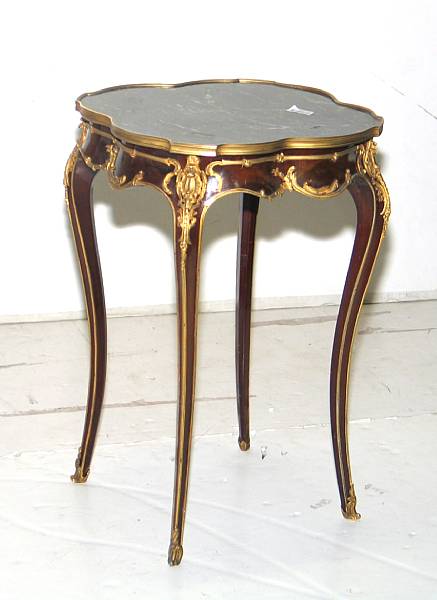 Appraisal: A Louis XV style gilt bronze mounted mahogany gueridon mid