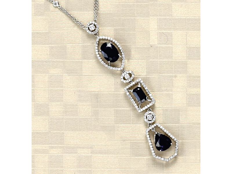 Appraisal: DIAMOND AND SAPPHIRE NECKLACE k white gold triple pendant necklace