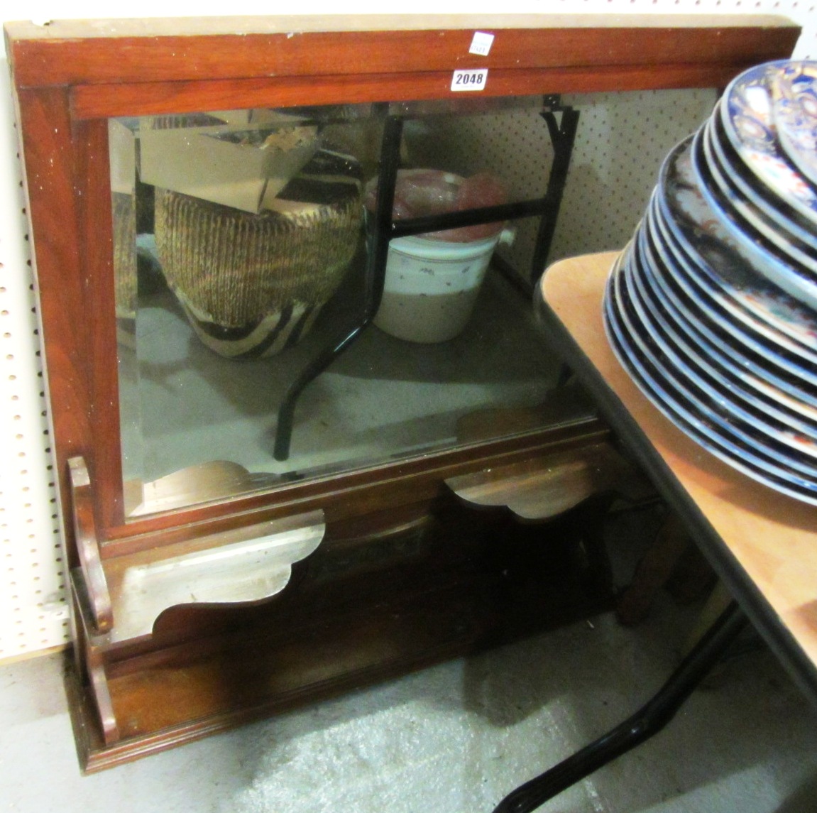 Appraisal: A mahogany overmantel mirror