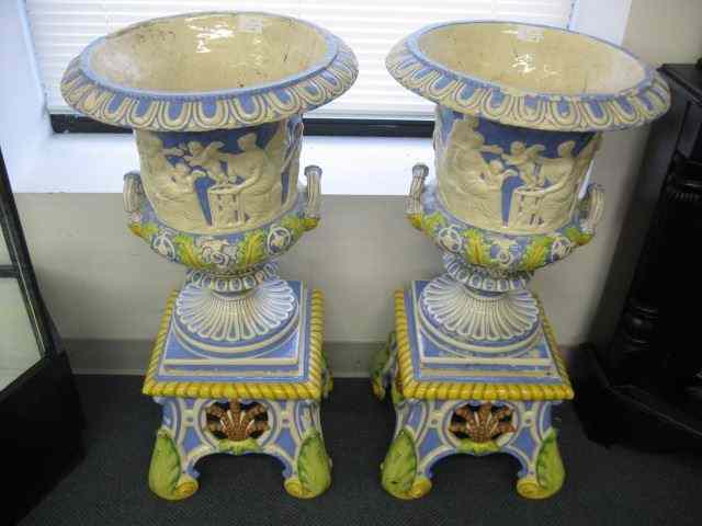 Appraisal: Pair of Italian Pottery Planters and Stands Della Robbia style