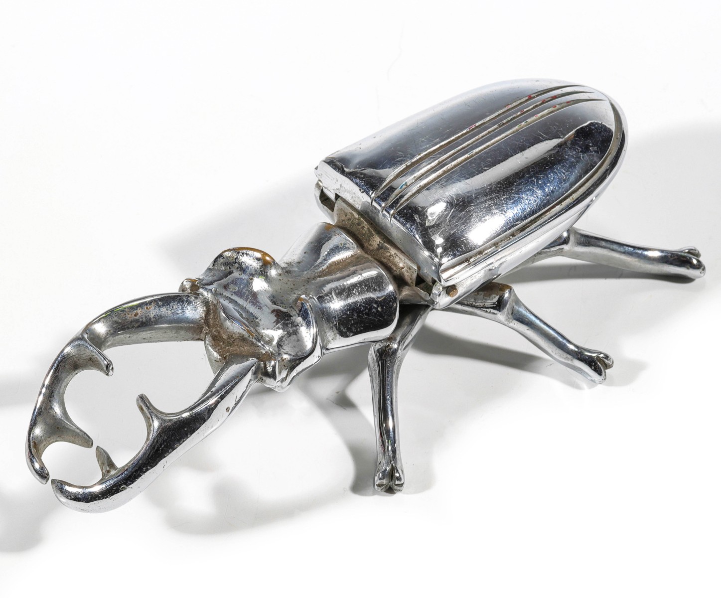 Appraisal: NICKEL PLATED BRASS STAG BEETLE MATCH SAFE C Measures inches