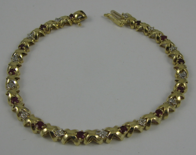 Appraisal: RUBY DIAMOND AND K GOLD BRACELET in length with round-cut