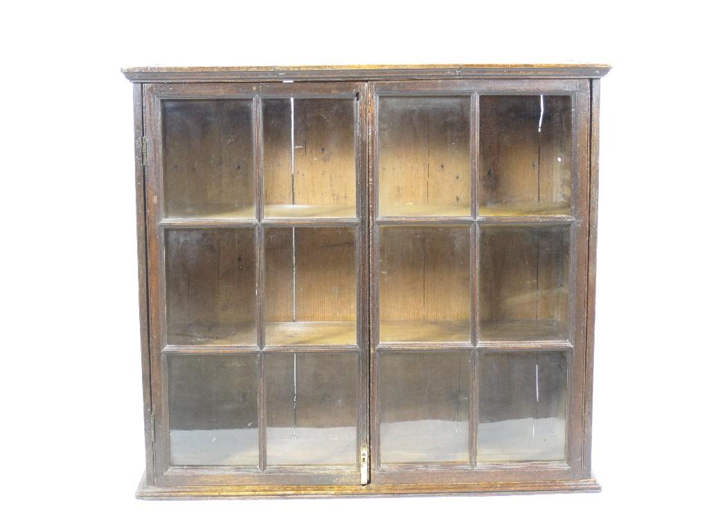 Appraisal: An th Century oak and pine wall hanging glass Cabinet